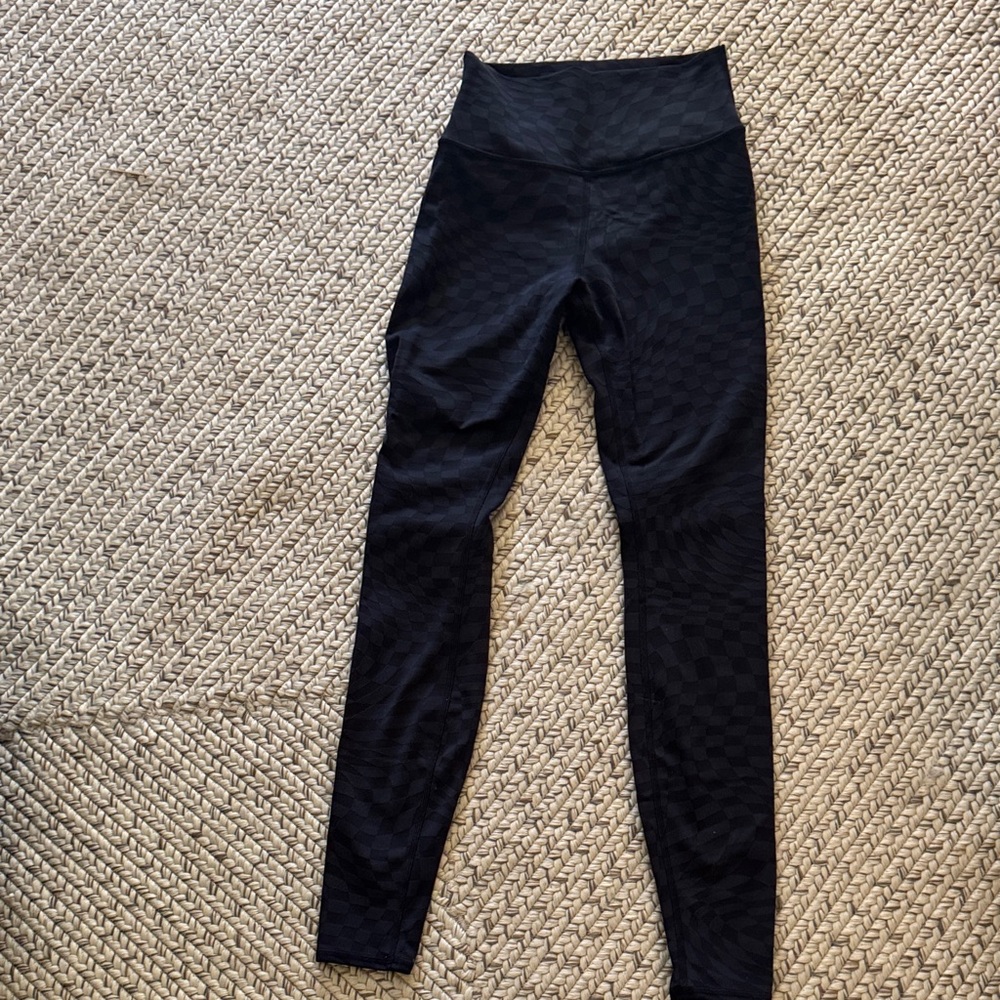 ALO Yoga Black High-Waisted Leggings with checked black pattern